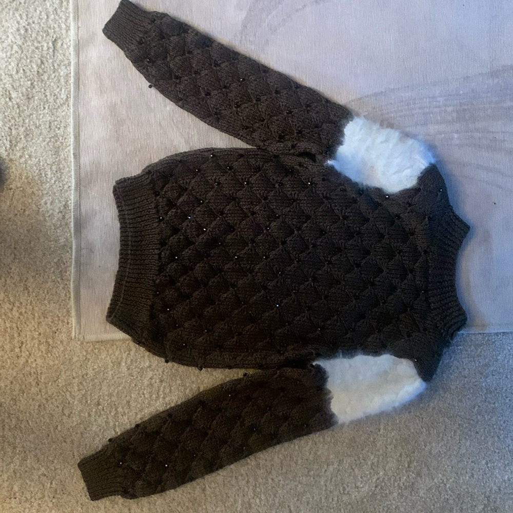 Brown sweater with beads all over. Furry at shoulders.